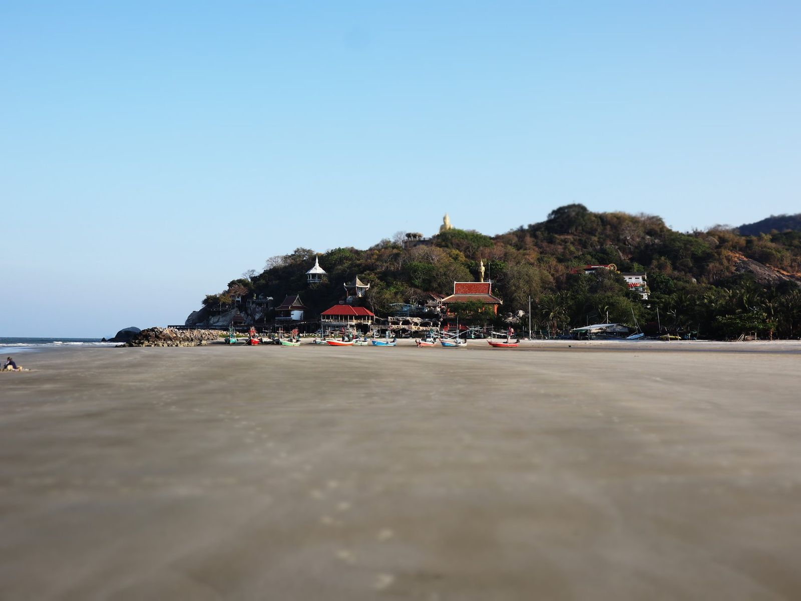 Khao Takiab beach and temple headland in Hua Hin at low tide